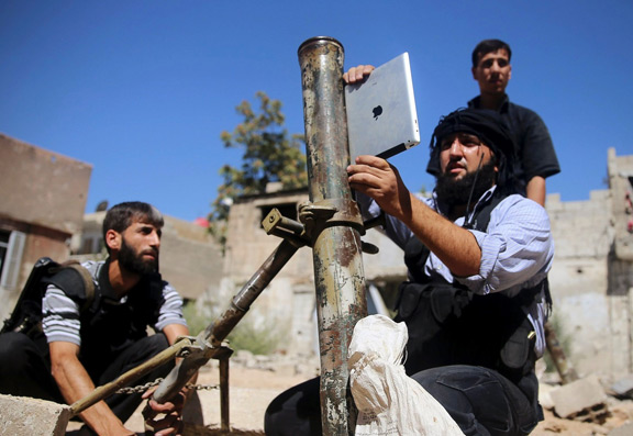 syrian-insurgents-ipad-aiming-artillery-raqwe.com-01